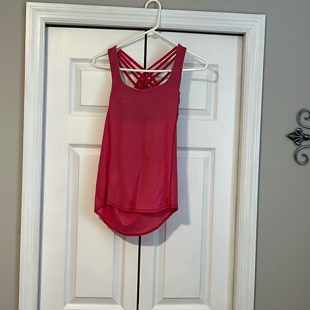 Pink stripe lululemon workout top with built in sports bra with flowers on bra